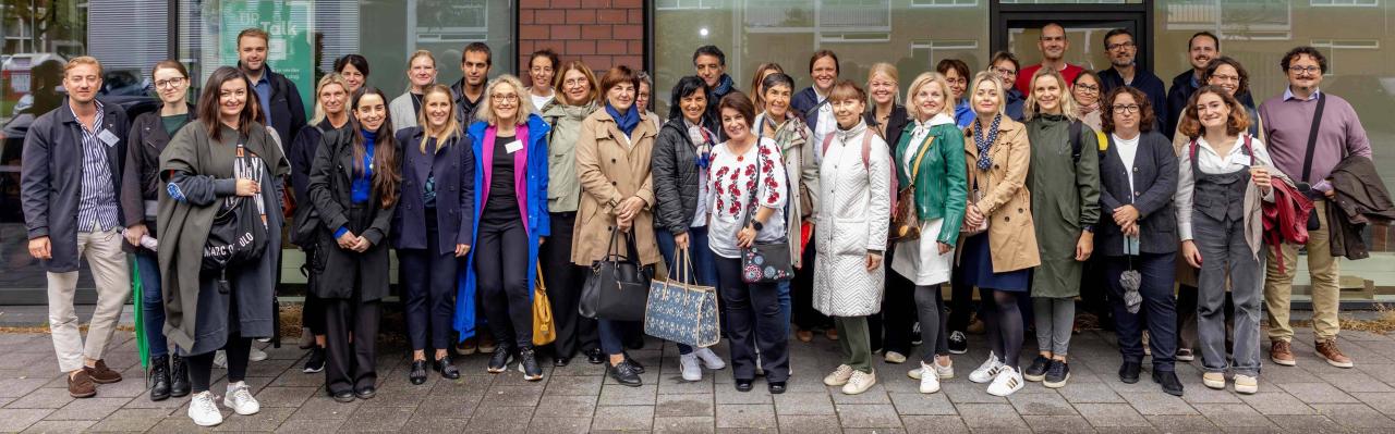 Group photo of participants during the onsite visit in Amsterdam, Netherlands.